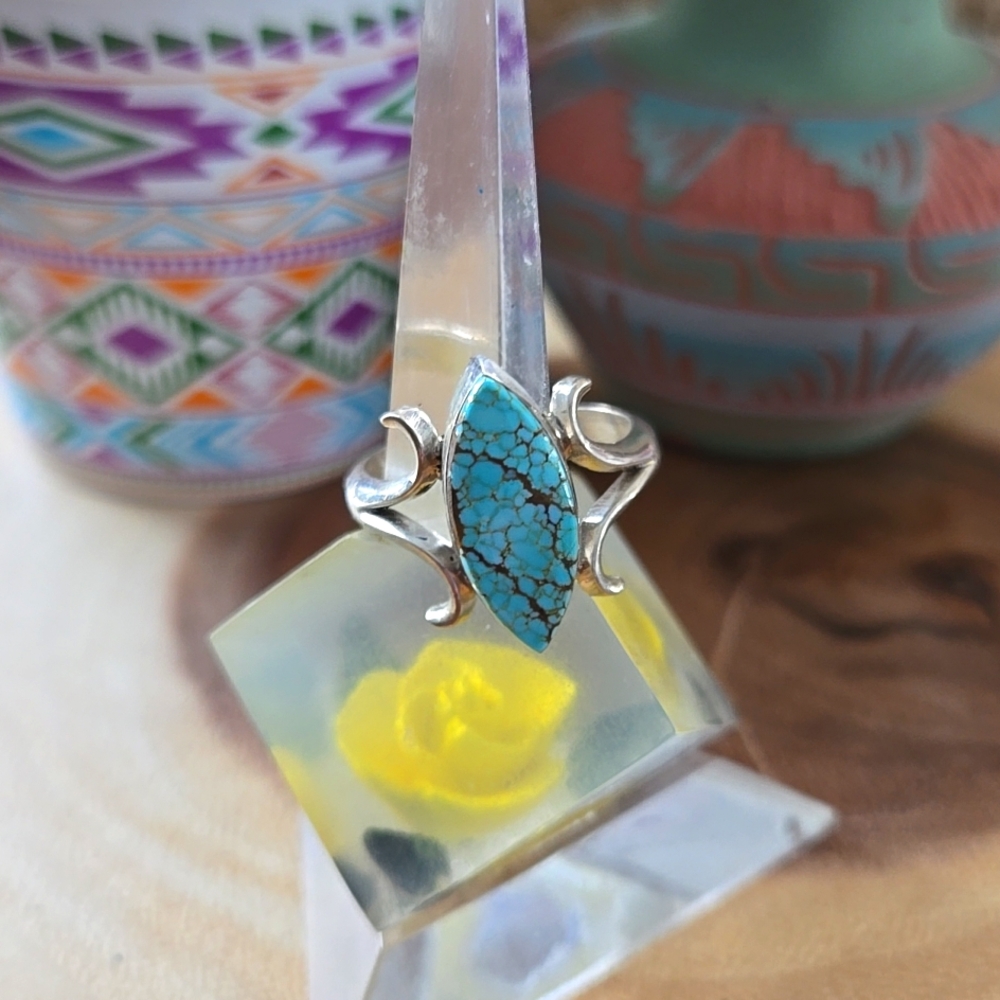 Sterling Silver Ring with a Turquoise Cabochon.